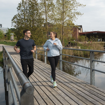 Greg Wise of Aretec Wealth running with his partner